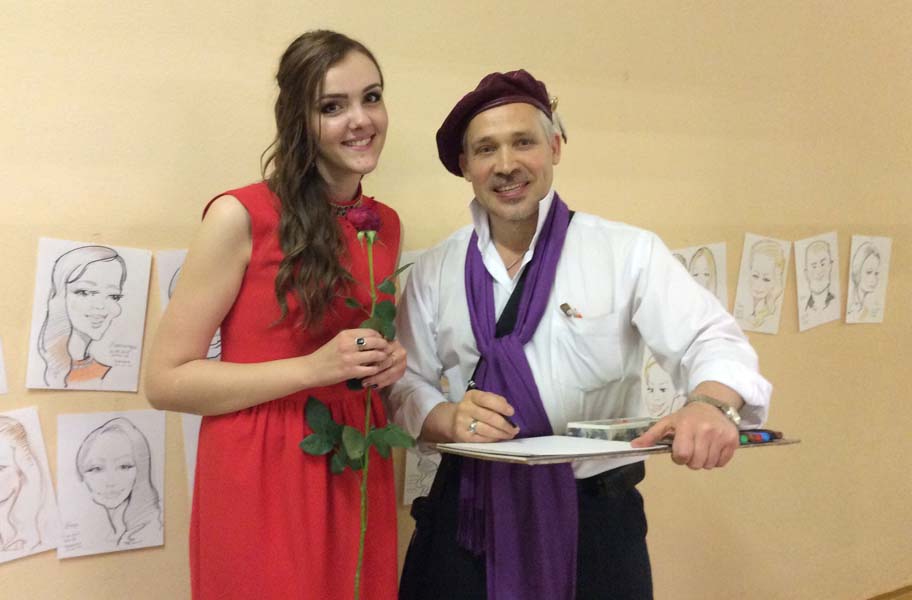 Шаржист на выпускном в школе